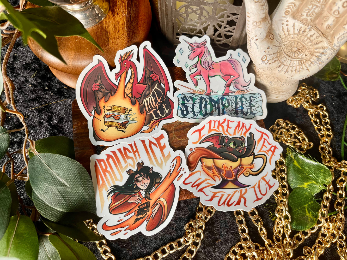 Set of four stickers with various Anti-ICE slogans and fantastical themes