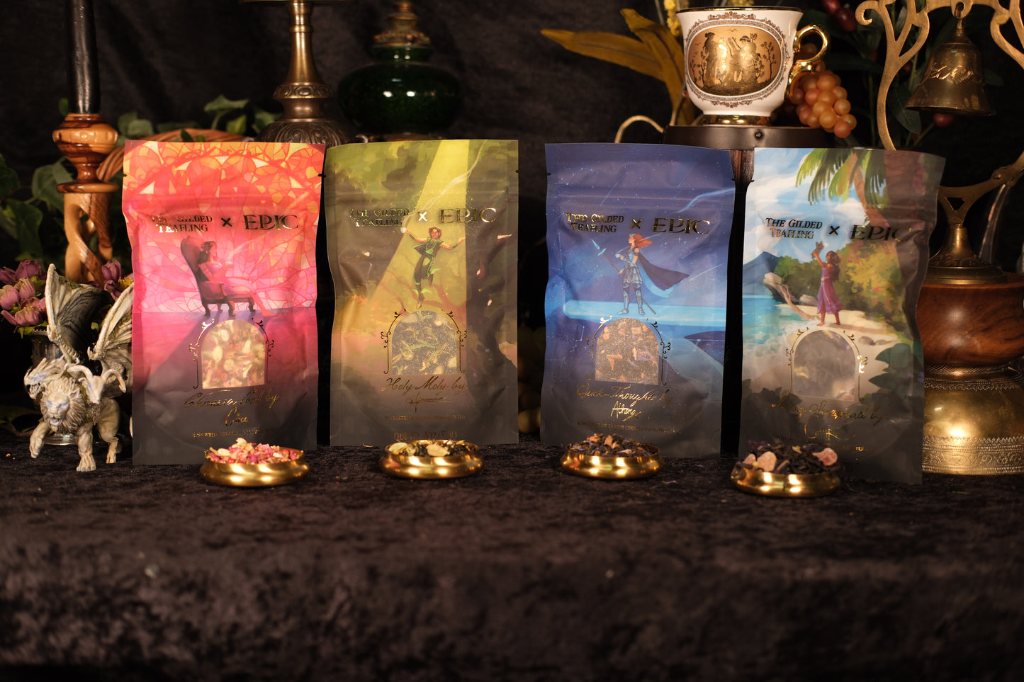 Four colorful 2 oz tea bags depicting illustrations of Circe, Hermes, Athena, and Calypso from Greek Mythology as portrayed in Epic the Musical.